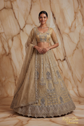 Champagne Gold Lehenga Choli marmeren achtergrond