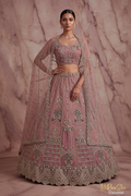 Dusty Rose Mauve Lehenga Choli marmeren achtergrond